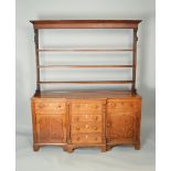 A Georgian oak breakfront dresser, the rack with three shelves,