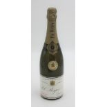 A bottle of Pol Roger Extra Cuvee de Reserve for Great Britain champagne 1971.