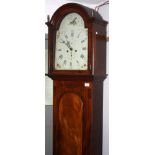 A mahogany eight day longcase clock, early 19th century, with a painted arched dial, height 221cm.
