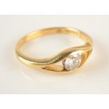 An 18ct gold wishbone set diamond solitaire ring.