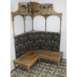 An Edwardian mahogany corner bench, decorated with William Morris style fabric, height 207cm.