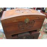 A Chinese carved camphor wood chest.