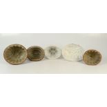 Three stoneware jelly moulds, 19th century, the largest width 19cm and two other jelly moulds.
