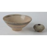 A Chinese provincial pottery bowl possibly Ming, and a South East Asian ointment jar,