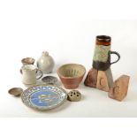 A Leach Studio pottery celadon glazed lamp base, a Leach flower spreader and other ceramics,