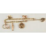 A gold charm bracelet, 14.2g.