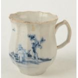 A rare 18th century Liverpool tulip form coffee cup with faceted sides and underglaze blue painted