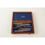 A set of brass and turned ivory drawing instruments, early 20th century,