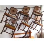 A set of six mahogany and walnut dining chairs, including two carvers,