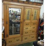 An Aesthetic Movement ash three piece bedroom bedroom suite, comprising of a wardrobe, height 216cm,