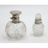 Two glass silver mounted toilet bottles.