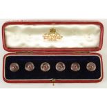 A set of six 15ct gold mounted pearl buttons by Wilson & Gill, pearl and diamond merchants,