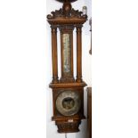 A Victorian oak wall barometer, height 100cm.