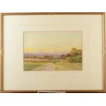 A watercolour of two figures on a rural path, signed by George Oyston, 1926, framed and glazed,