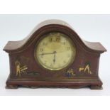 A Mappin and Webb chinoiserie lacquered red ground small mantle clock.