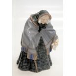 A Royal Copenhagen model of an Old Lady No.784, height 20cm.