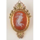 A carved hardstone cameo pendant/brooch in two colour high purity gold, height 58mm.