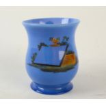 An early 19th century blue glass European mug,