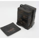 A Japanese black lacquered jubako, (stacking food box), 19th century,