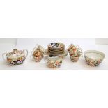 A Newhall pattern 1153 part tea service, comprising seven tea cups, five coffee cups,