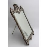 A fine and ornate dressing table mirror by Walker and Hall,