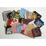 An assortment of multi-coloured ladies' silk scarves in various sizes, including Jaeger,