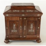 A Regency rosewood and mother of pearl inlaid table cabinet,