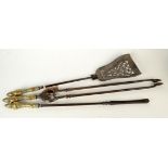 A set of three Georgian steel and brass fire irons, length of tongs 75.5cm.