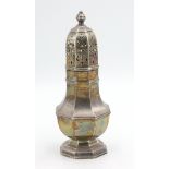A large and heavy silver vase sugar caster with a finial by the Silversmiths and Goldsmiths Company,