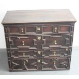 An Jacobean oak chest of drawers, with four long drawers, height 81.5cm, width 96.5cm, depth 52.5cm.