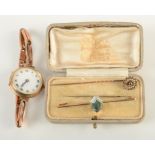 A ladies gold cased wristwatch on expanding gold bracelet,