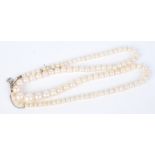 A graduated pearl necklace of approximately 100 pearls, the largest 7.