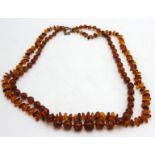 Two amber necklaces, weight 52g.