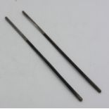 A pair of white metal mounted chopsticks, length 28.