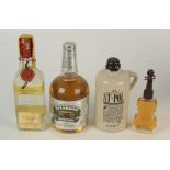 A mixture of spirits including a Suntory Royal Whisky in Violin Bottling,