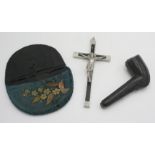 A Meerschaum silver mounted pipe, cased, a crucifix and an embroidered pouch.