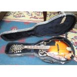 A Gremlin YHM 500 eight string accoustic mandolin, length 69.5cm, cased.