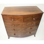 A Victorian mahogany bow front chest of drawers, with two short and three long drawers,