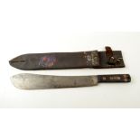 A military machete, the blade inscribed 'Martindale Birmingham,KE8277 1964', in leather scabbard,