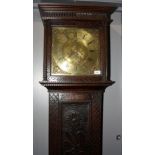 An eight day carved oak longcase clock, 18th century,