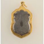 An Islamic pendant.
