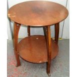 A Sessionist style mahogany occasional table, height 66cm, diameter 56cm.