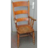 A Victorian kitchen armchair, height 109.5cm, width 53cm.