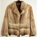 A short ladies' coney fur jacket, light brown,size 12/14, length 25cm.