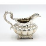 A Rococo style silver jug by Joseph & Albert Savory, London 1844. 8.1oz.