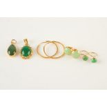 Two gold mounted jade pendants and two pairs of gold mounted jade earrings,