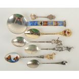 A Scandinavian enamelled silver spoon, other spoons.