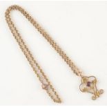 A floral 9ct gold and amethyst pendant on a 9ct gold belcher link chain, 7g.