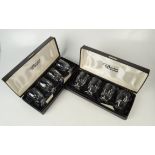 A set of eight Waterford Irish cut glass footed tumblers, boxed as two sets of four.