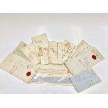 Twelve early to mid 19th century assorted covers and envelopes,
